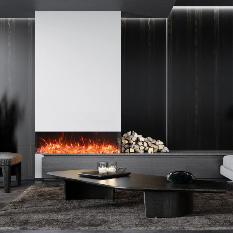 Modern living room featuring a sleek electric fireplace with a glowing flame effect, a minimalist coffee table, and a stack of firewood, all set against dark wood paneling and soft lighting.
