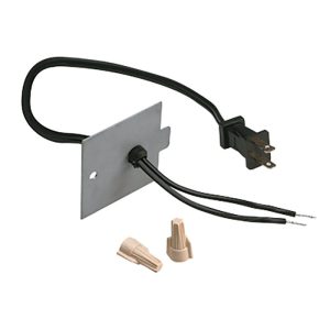 Electrical connector assembly featuring a metal plate, black wires, and wire connectors for secure electrical connections.